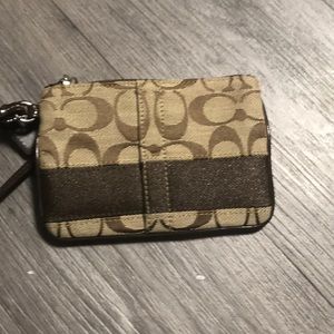 FREE with purchase of Coach or MK item